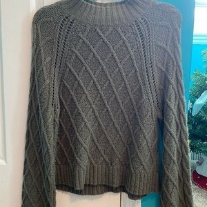 Knitted mock-neck sweater, medium size, good condition.